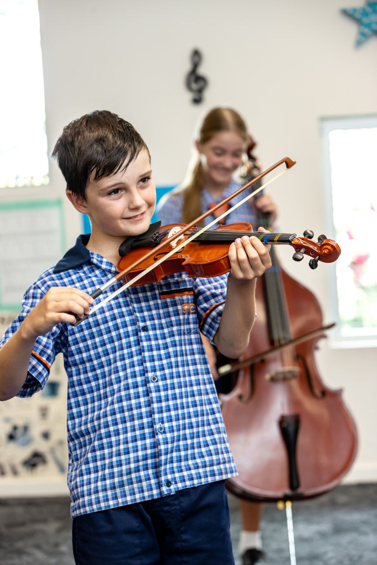 Student playing the violin