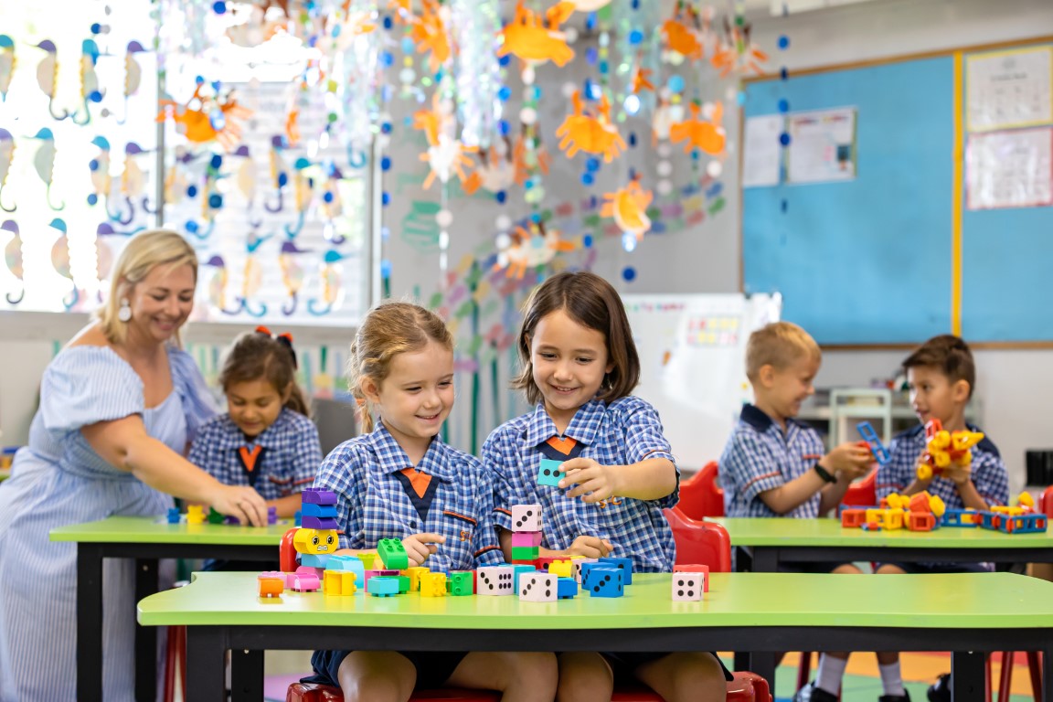 Students learning in the Prep classroom with a teacher