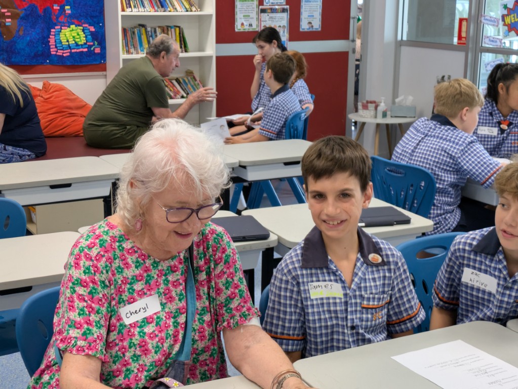 Adult and students in a classroom