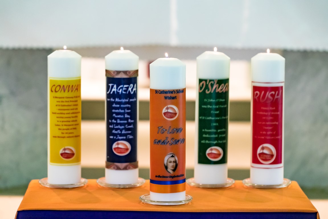 St Catherine's candles - Candles with the names of the school and houses on them